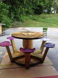 Wooden spool safe is a stylish and handy holder for your threads which can hold an incredible 72 details. Wood Cable Spool Table With Tractor Seats Custom Order Only No Shipping Local Wooden Spool Tables Cable Spool Wood Spool Tables