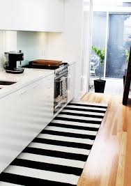 Black And White Striped Doormat Beautiful Courtyard Attaching To A Simple Kitchen White Kitchen Rugs Kitchen Rug White Kitchen Interior Design