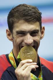 Michael Phelps wins gold in his last Olympic race in the Men's 4x100m relay 