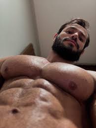 This muscle god displaying his massive muscles and body