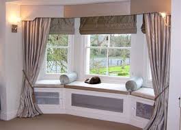 Some of your options include dressing each window separately, mounting your window coverings on the inside of the molding, or you can give plantation. 4 Functions Of Bay Window Valances Homedecomastery