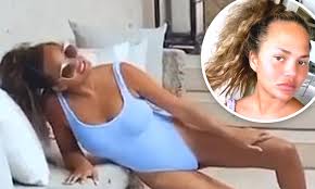 Chrissy teigen pens letter amid cyberbullying scandal: Chrissy Teigen Shows Off Gorgeous Figure In Lilac Swimsuit As She Poses For Photo Shoot In Mexico Daily Mail Online