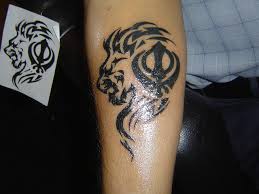 Sikh's were guided by their gurus to not to remove hairs from their body as it is against the nature/ god who gave us birth and this body, so should keep it complete, neat and clean and without any. Tribal Lion Khanda Tattoo Novocom Top