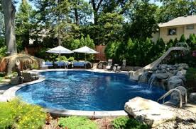 Just relax under the shade while your children play in the pool. Small Sloping Backyard Fits Beautiful Oasis Long Island Ny Pool New York By Deck And Patio Company Outdoor Living Experts Houzz