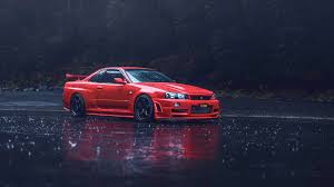 Download Nissan Skyline Gtr R34 Rainy Setting Wallpaper | Wallpapers.com