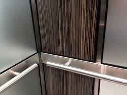 The central mirror is also bevelled. Glass Elevator Wall Panels Design Specify Fabrication Elevator Scene