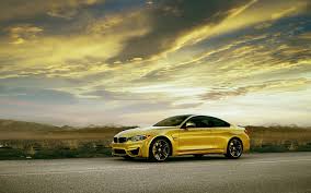 Download Wallpaper Bmw M4 Coupe F82 Yellow Car Side View 1920x1200 Hd Picture Image