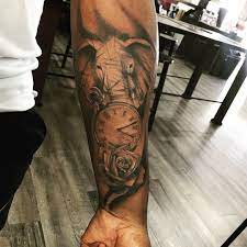 Elephant Tattoo With Stopwatch And Rose Elephant Tattoo Tattoos Elephant