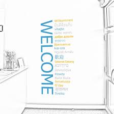 The most common mistake most people make in decorating their walls is to sprinkle things around just to fill empty space. Welcome Feature Decal Set In Many Languages Walls That Talk Removable Designer Wall Decals Kids Stic Wall Decals Business Signs Wall Stickers Home Decor