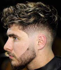 Low skin fade with long wavy hair. 35 Best Low Fade Haircuts For Men 2021 Guide