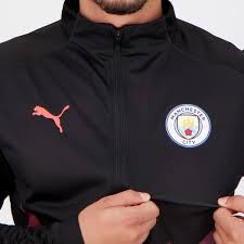 The tracksuit jacket has a few aesthetic signatures that we wanted to be sure to retain: Puma Manchester City Stadium Black Jacket Futfanatics