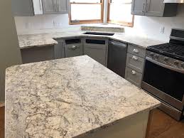 White Springs Leathered Granite Countertops Fabricated And Installed By Affordable Granite Cabinetry Affordable Granite Kitchen Remodel Leather Granite