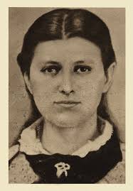 This is a family portrait of the John G. and Nancy Kitts Bane. L-R: Front:  Nancy, Sam, John, Charlie. Back: Maggie, Virginia, Johnny, Lula, Fannie,  Willie.