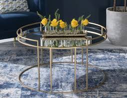The sequoia coffee table adds a shiny focal point to a living room or den, with its resin acacia root base finished in either silver or gold leafing. Torrance Gold Coffee Table Round Mirrored Top Cfs Furniture Uk