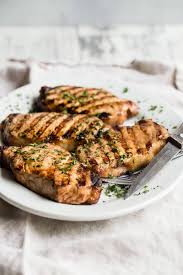 Thick cut pork chops with blueberry salsafloating kitchen. Grilled Pork Chops Culinary Hill