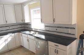 steel gray granite with white cabinets