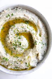 Classic baba ganoush is made by roasting eggplants until soft, scooping out the insides, and mashing with tahini, garlic, and spices. Baba Ganoush Recipe How To Make Baba Ganoush The Forked Spoon