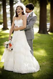Our wedding gowns are made to order. Ivory Lace And Pleated Organza Tiered Wedding Dress Vq