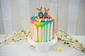 Drip Cake Ostertorte Mit Bunten Regenbogenfarben Und Schokoladen Haschen Osterkuchen Tropfkuchen Schokoladen Hase