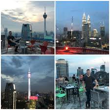 Head over to the top deck overlooking the pool for a clearer picture of the twin. Heli Lounge Bar Kl Guide To Helipad Bar Dress Code Drink Prices Hours