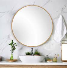 Circle mirror with vines around it. Brushed Gold Round Mirror The Woodlands Cypress Houston Tx B De Vine