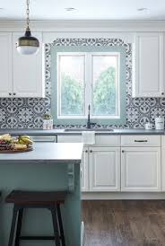 Pastel Green And White Kitchen With Patterned Tile Backsplash Kitchen Interior Cottage Style Kitchen Kitchen Design Small
