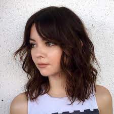 They automatically add texture to your hair a part of hearst digital media marie claire participates in various affiliate marketing programs, which means we may get paid commissions on. Middle Part Bangs Shoulder Length Wavy Hairstyles Hair Styles Medium Hair Styles Medium Length Hair Styles