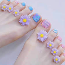For the base of this design i used a purple nail polish and for the design on the big toe nail i used white floral nail stickers. 8pcs Set Toe Silicone Separator Nail Art Diy Tool Pedicure Flower Water Drop Crystal Diamond Pearl Separator Tools Foot Care Foot Care Tool Aliexpress