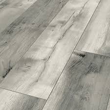 £13 per sq m | buy now from b&q for a smoky grey wood effect combined with a smart matt surface look no. Laminate Flooring Wood Finish Laminated Floors Wickes