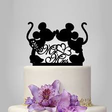 27 Magical Disney Wedding Cake Toppers Inspired By Dis Disney Wedding Cake Toppers Mickey And Minnie Wedding Disney Wedding Cake