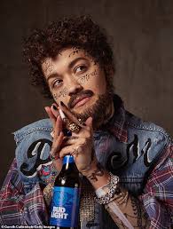 Rita Ora looks unrecognisable as she wears face tattoos and fake beard to  transform into Post Malone