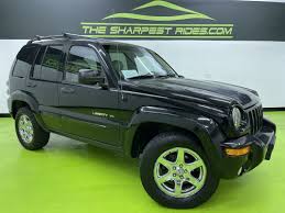 Image result for Brilliant Black 2003 Jeep