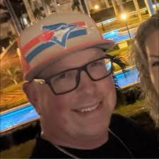 How to reduce wing rock in a 74" Slick airplane with a GP-38 engine?