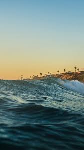 Imagine sitting in the warm sand, sunshine lighting your face, gentle ocean waves lapping at the shore. Mz45 Sea Wave Beach Vacation Summer Wallpaper