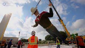 Ask three people in fort worth and you're likely to get four different answers. Big Tex Is Installed At The State Fair Of Texas Youtube