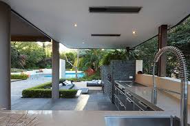 Clean Lines And Open Spaces Combine With Sculpted Detailing To Create Contemporary Outdoor Spaces Check Outdoor Kitchen Design Contemporary Patio Patio Design