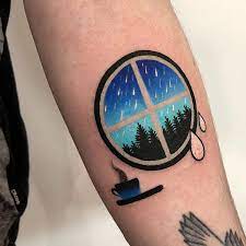 Circular Window And A Coffee Cup Tattoo On The Left Inner Forearm Tattoos Cup Tattoo Rain Tattoo