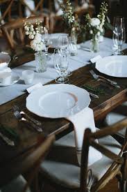 Simple Wedding Place Setting Idea Wooden Tables And White Plates Christina Logan Design Wedding Table Settings Wedding Place Settings Table Setting Design