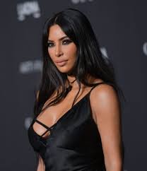 New hair color alert — or just new hair? Kim Kardashian Throws Lavish Christmas Bash Makes Peace With Paris Hilton The Hollywood Gossip