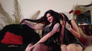 Hair fetish. Dominatrix Nika and DarkSpaceSolar play with their long hair