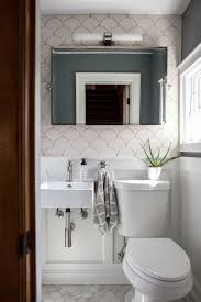A half bath needs to contain, at a minimum, a toilet, a sink, and a mirror. 41 Cool Half Bathroom Ideas And Designs You Should See In 2021