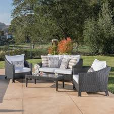 Noble House 4 Piece Wicker Patio Conversation Set With White Cushions 37243 The Home Depot Conversation Set Patio Patio Outdoor Patio Furniture