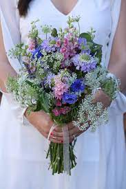 Some years every bride wants red roses, other years it's a cloud of delicate baby's breath. How To Make A Wildflower Bouquet In 3 Steps Fiftyflowers