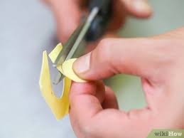 Take the drill and position it on the middle of the bottle cap, then drill a hole in it. 3 Ways To Make A Water Gun Wikihow