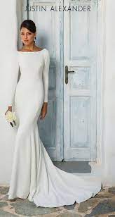 Complete your look with wedding dress accessories that are so beautiful and will harmonize with the dress you picked. Style 8936 Crepe Long Sleeve Wedding Dress With Beaded Illusion Back Justin Alexander Cowl Back Wedding Dress Wedding Dress Long Sleeve Wedding Dress Silhouette
