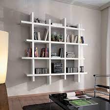 Libreria Da Parete In Legno Bianco Gilmar Sei Alla Ricerca Di Un Ampia Ed Elegante Libreria Da Parete Librerie A Parete Design Libreria Di Casa Arredamento
