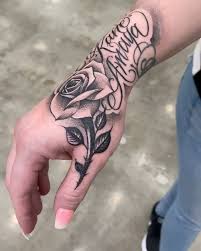 A red rose tattoo is associated with romance and passionate love. Art Amazing Hand Rose Script Names Tattoo By Awesome