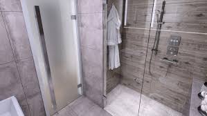 Depending on the building construction this may require the shower floor to be elevated a few inches above the bathroom floor. 2021 Tub To Shower Conversion Cost Bathtub To Walk In Shower Angi Angie S List