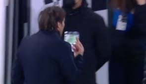 Antonio conte, manager of chelsea is greeted by champagne showers after walking into the chelsea changing room after to celebrate winning the league with his team after the premier league match between west bromwich albion and chelsea at the hawthorns on may 12, 2017 in west bromwich. Mv42venwea890m