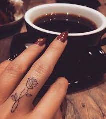 Pretty Rose Finger Tattoos Designs Finger Tattoo Designs Rose Finger Tattoos Small Meaningful Tattoos For Women